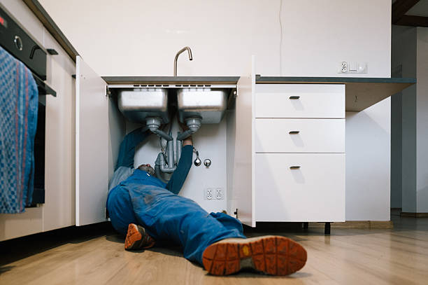 Professional Emergency Plumber technician working in Highland, KS